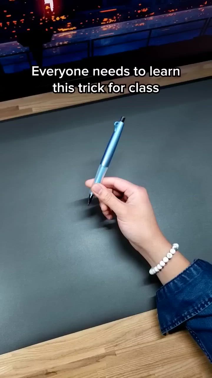 This contains an image of: The INFINITY Pen Spinning Trick