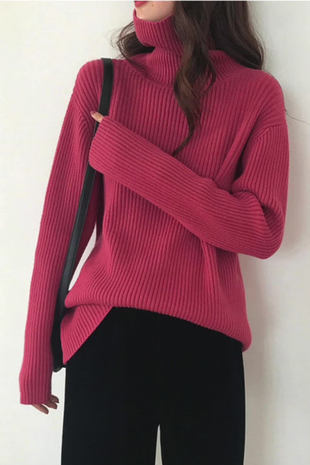 This contains: This 2024 Women Turtleneck Sweater is the perfect addition to your autumn and winter wardrobe. Made with the highest quality soft and warm knit, this pullover provides both comfort and style. The loose fit and turtleneck design make it a versatile piece for any occasion. Stay cozy and chic with this essential basic top.