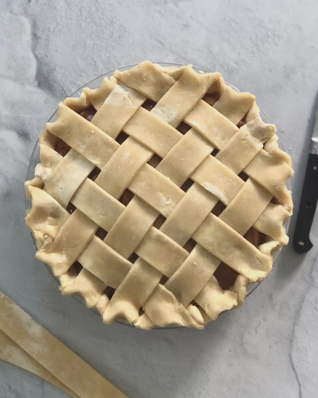 This may contain: an uncooked pie sitting on top of a table