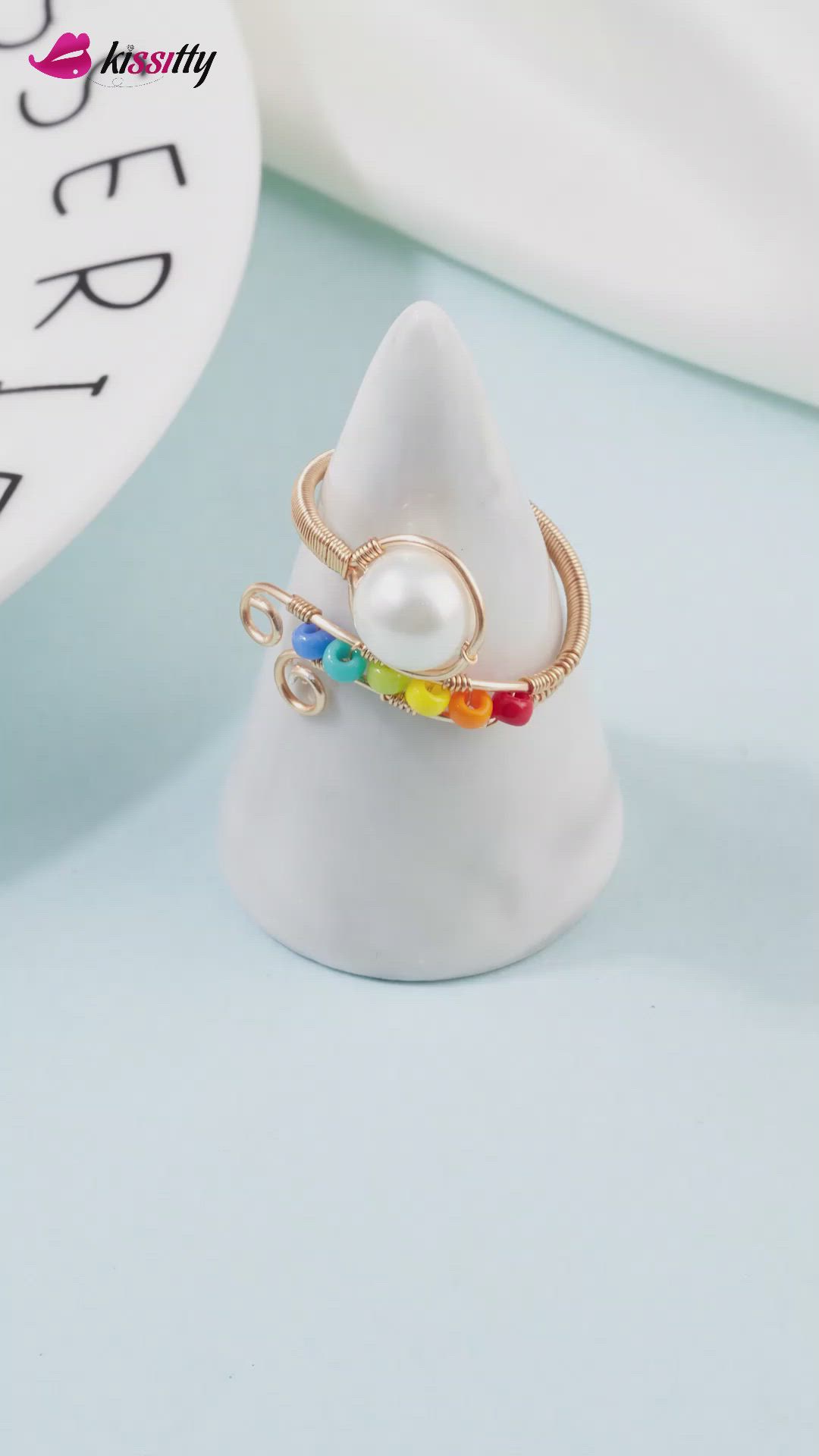 This ring using rainbow seed beads and white pearls can brighten your day! If you like this video, don't forget to like, save, and follow us for more free tutorials on handmade jewelry and DIY crafts. Click the link to learn more information about our store. 🙌