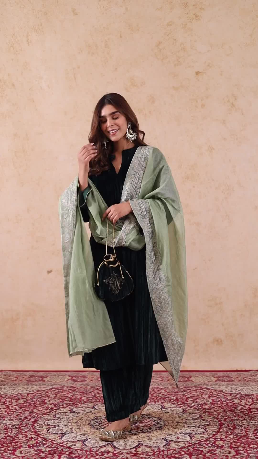 This contains: Bottle Green Velvet Suit with Sage Embroidered Dupatta- Inching India