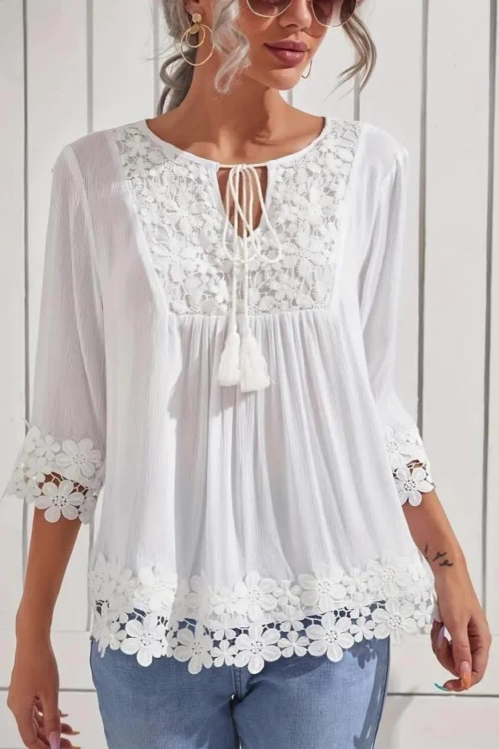 Add a touch of elegance with this Floral Lace Tassel Decor Blouse. Featuring 3/4 sleeves and a tie neck, it combines intricate lace detailing with tassel accents for a sophisticated look. Ideal for spring and fall, this blouse offers both style and grace for any occasion.