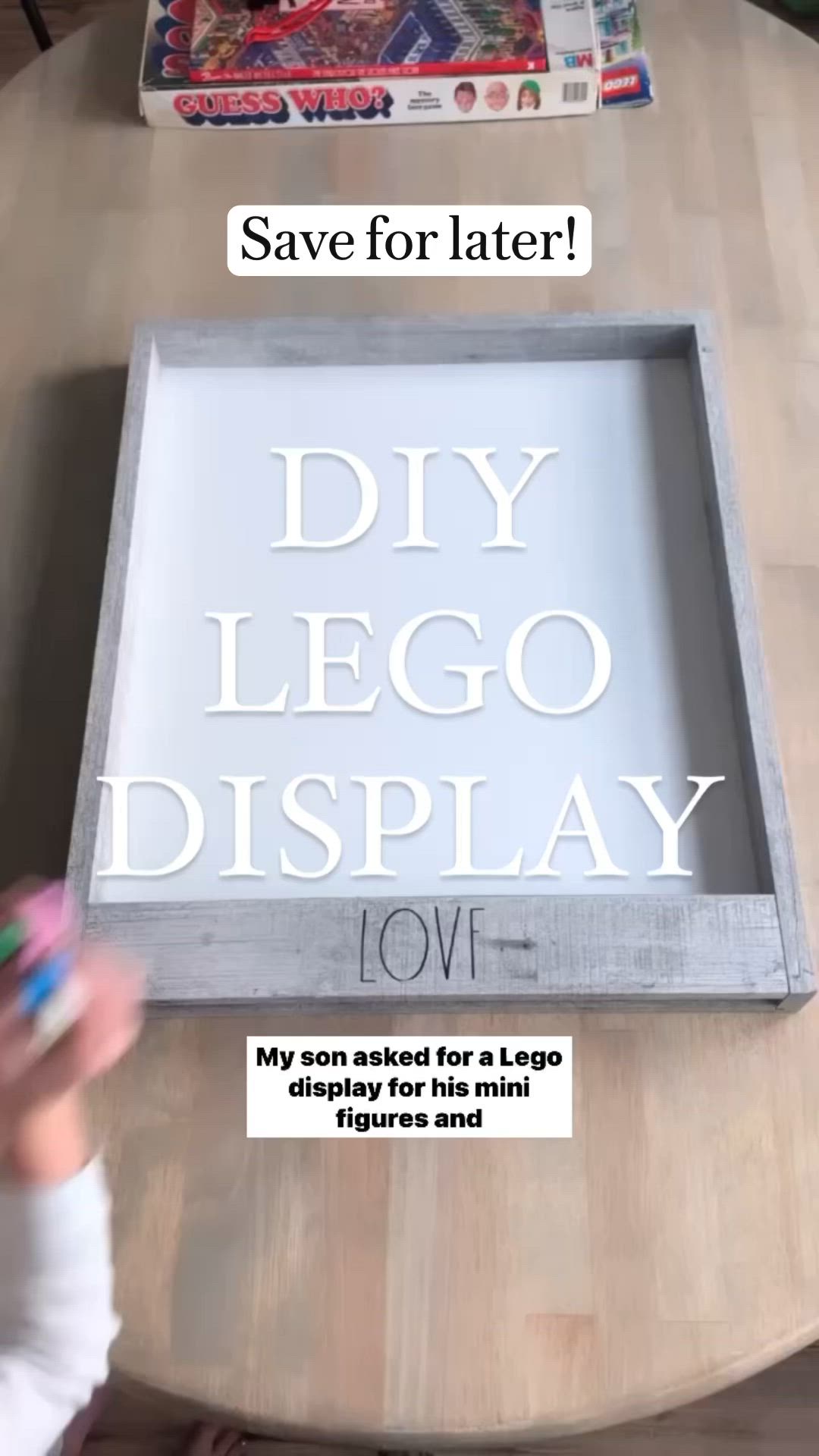 This may contain: legos are arranged in a shadow box with the words save for later