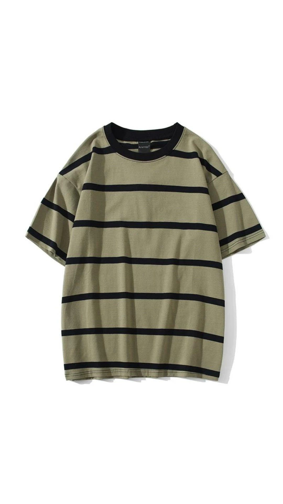 This contains: Show off your chic style with these Men's Striped Streetwear All-Match T-shirts! Perfect for any laid-back occasion, these casual tees will have you looking dapper with minimal effort. Let your personality shine through your outfit with these fashion-forward shirts! (Because looking good shouldn't be hard work!)