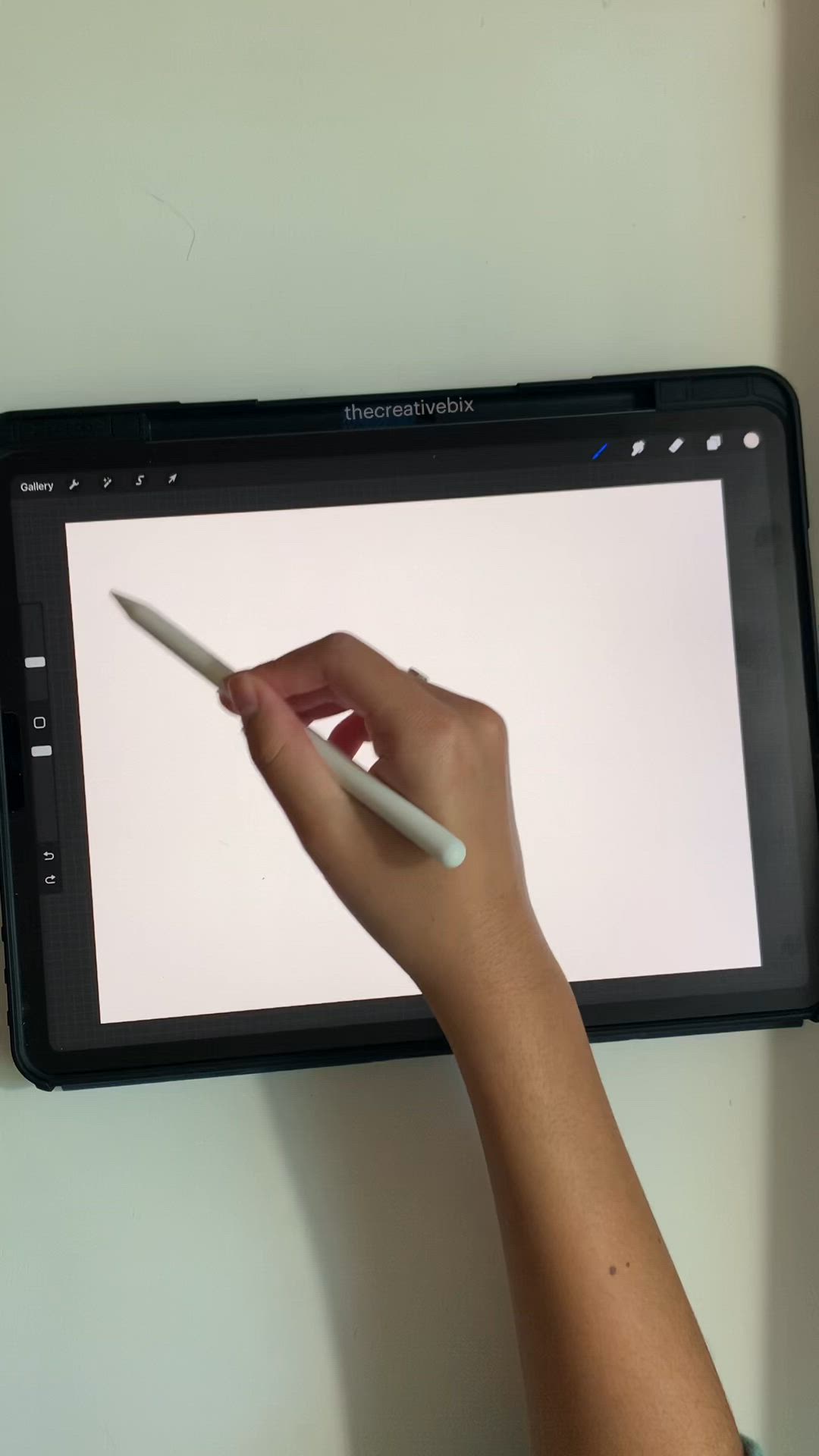 This may contain: someone is drawing the word colorful on an ipad screen with a marker and pen in their hand