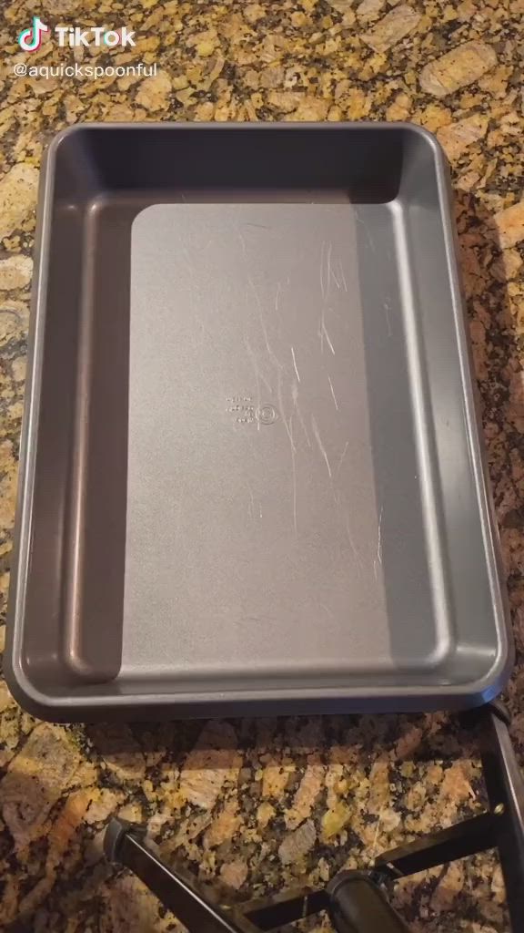 This may contain: an empty pan sitting on top of a counter