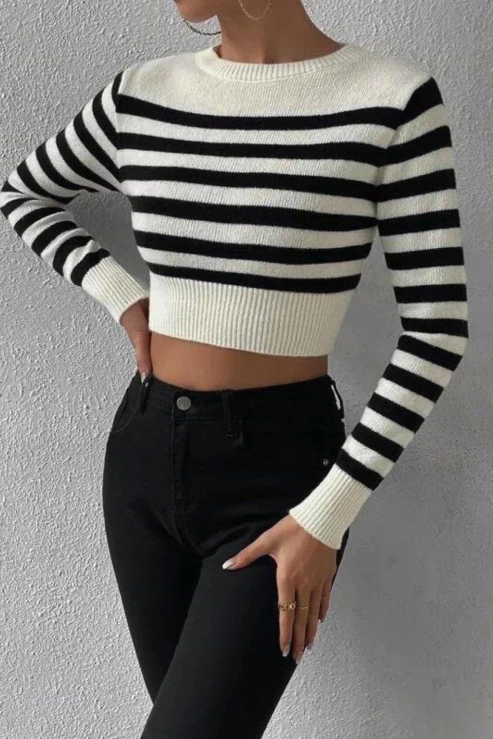 Step into style with our Striped Cropped Slim Fit Knit Top. This trendy piece combines modern design with comfort. The slim fit accentuates your silhouette, while the playful stripes add a touch of fun. The cropped length makes it perfect for pairing with high-waisted bottoms.