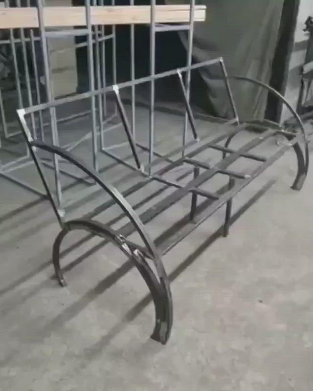 This may contain: a metal bed frame sitting on top of a floor