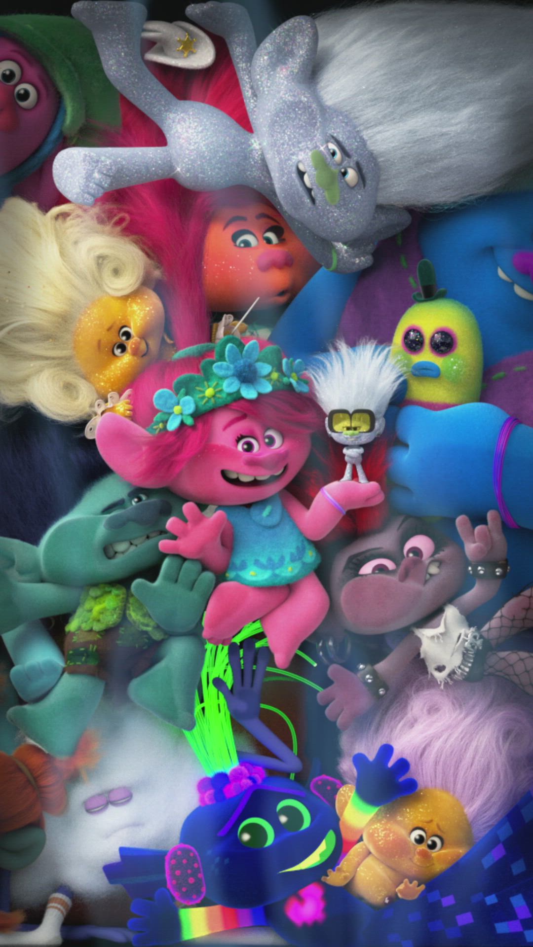 This may contain: an animated cartoon character surrounded by many different colored monsters and other characters, all looking at the same person