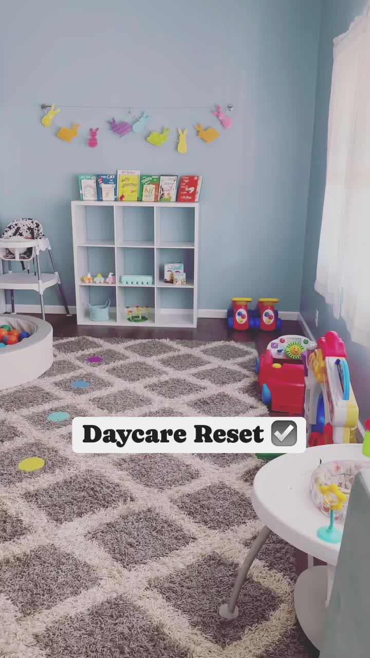 This may contain: a child's playroom with toys and bookshelves on the walls, carpeted floor