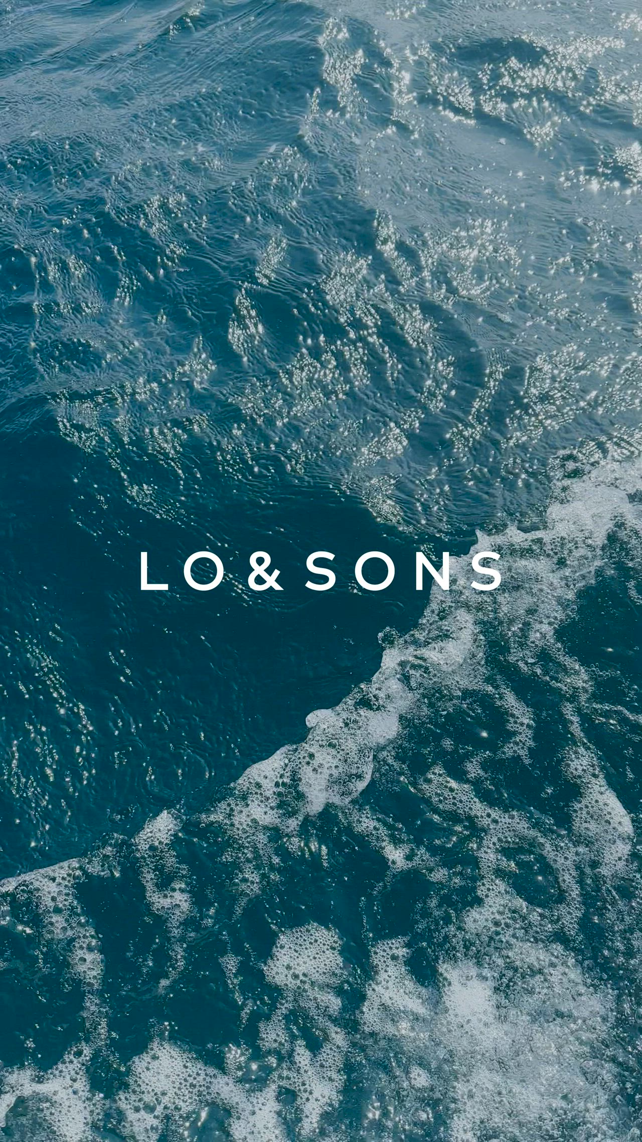 This may contain: the words lo and sons are above an ocean wave