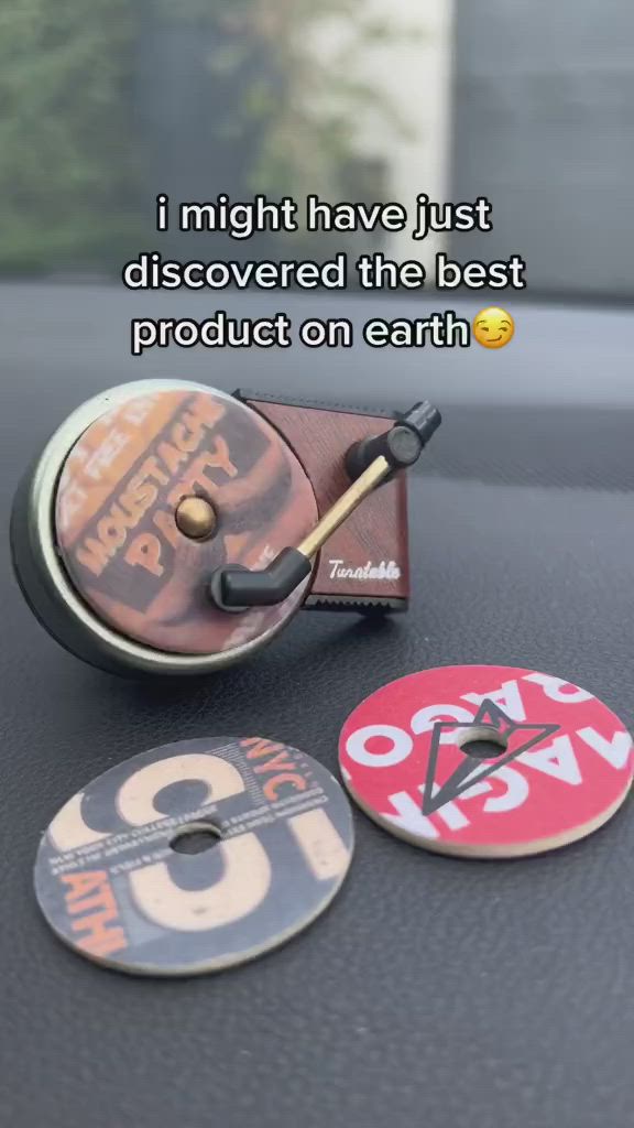 This may contain: a car dashboard with two magnets attached to the dash board and one saying i might have just discovered the best product on earth