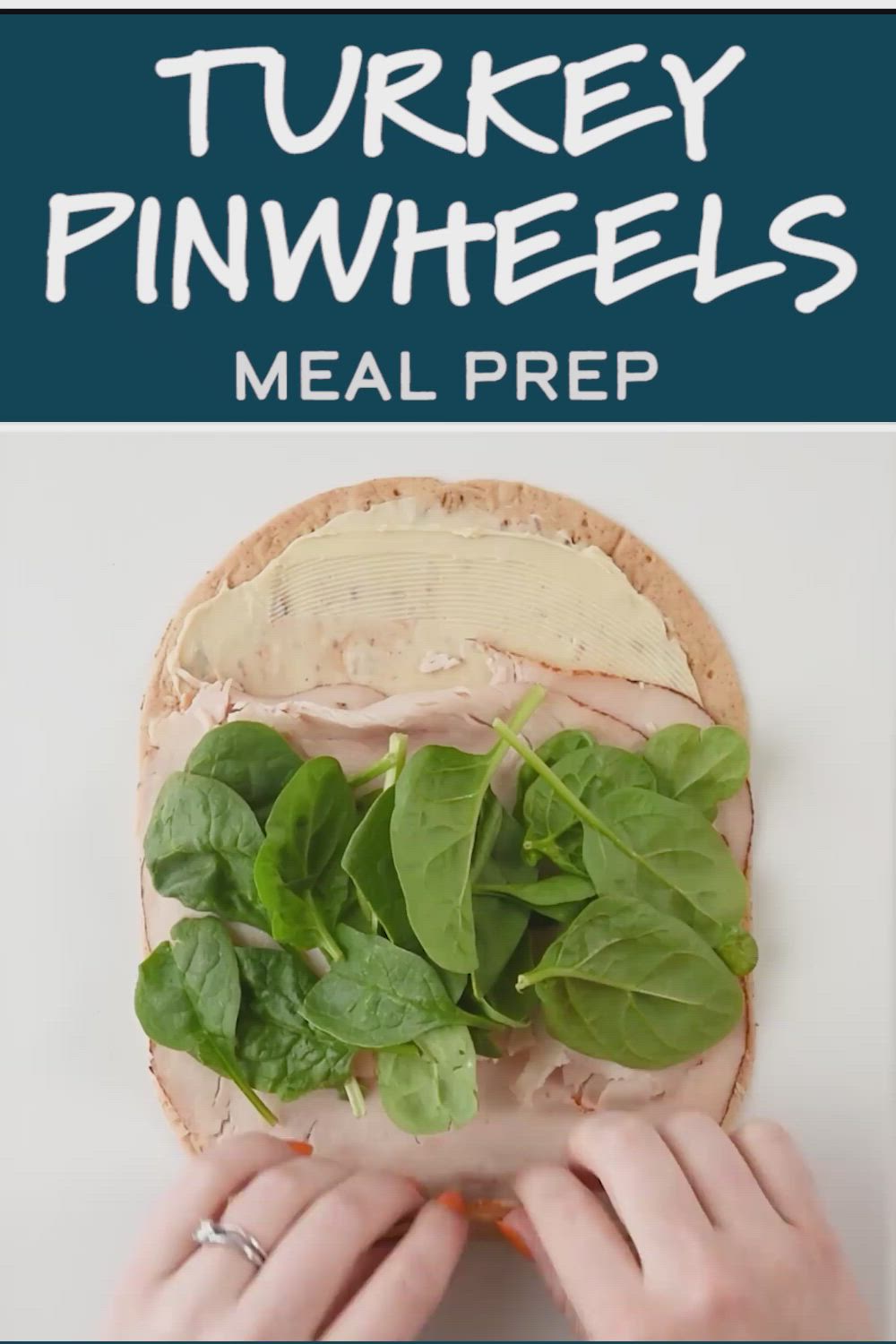 This may contain: the turkey pinwheels meal prep is shown with spinach leaves and peanut butter