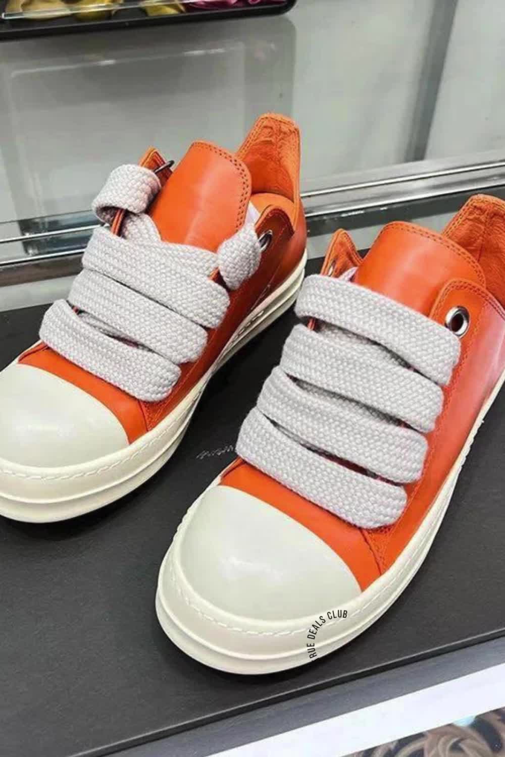 This contains: Orange Leather Sneakers Thick Sole Unisex