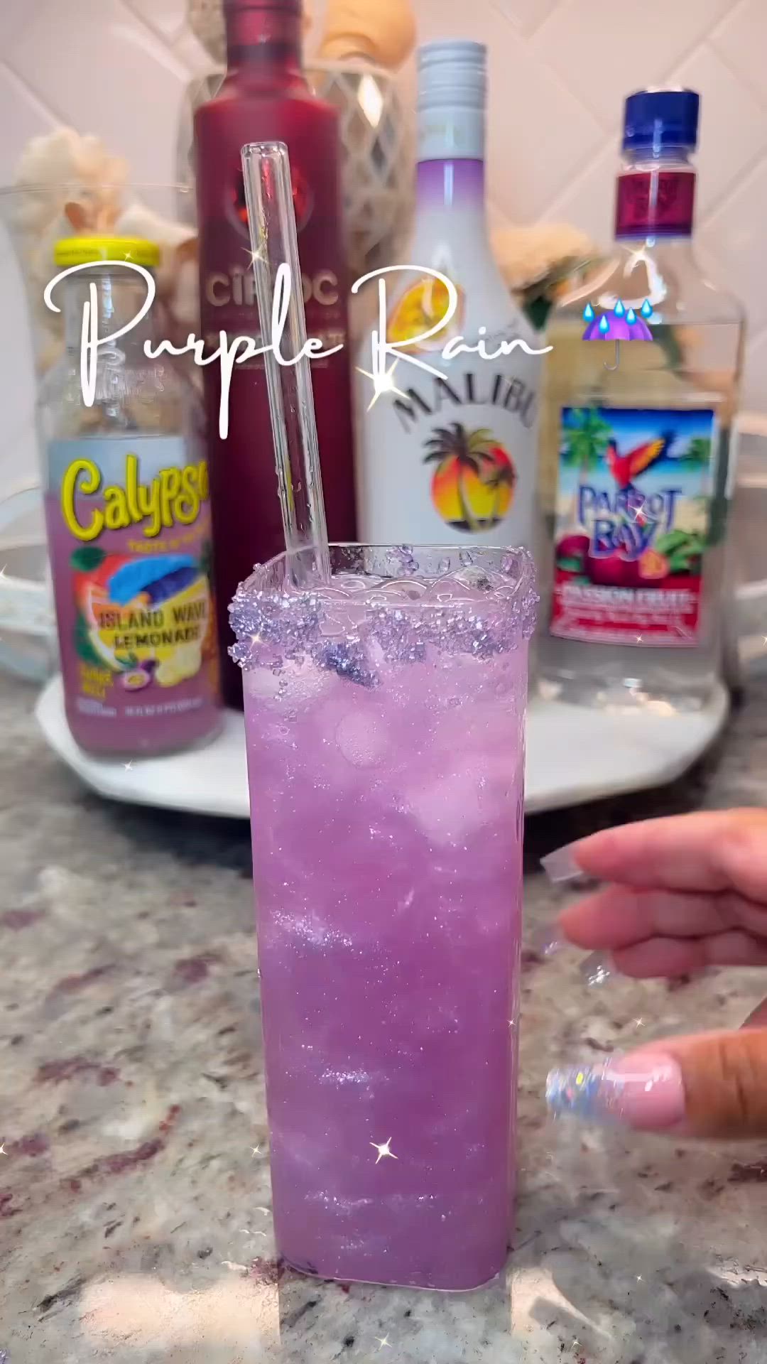 This may contain: a person holding a purple drink in front of bottles on a counter with text overlay that says purple punch