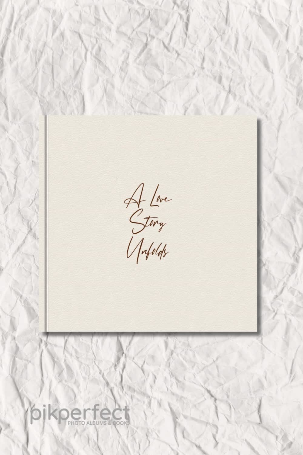 This contains: Fast-moving GIF showcasing a sequence of wedding album titles, elegantly embossed in white text on royal blue linen flushmount albums.