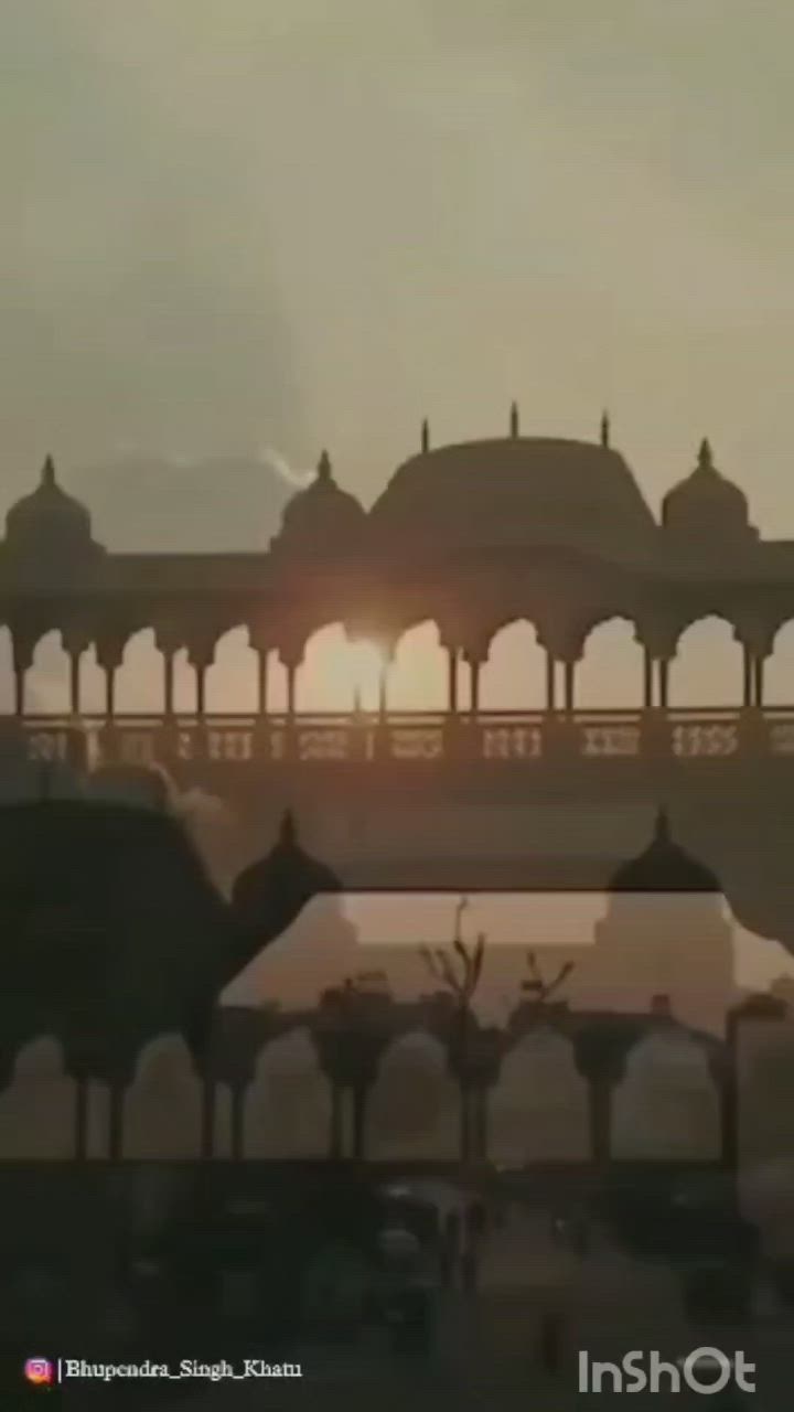 This may contain: an aerial view of people walking in front of a building with many pillars and arches