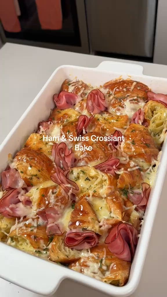 This may contain: a casserole dish with ham and cheese