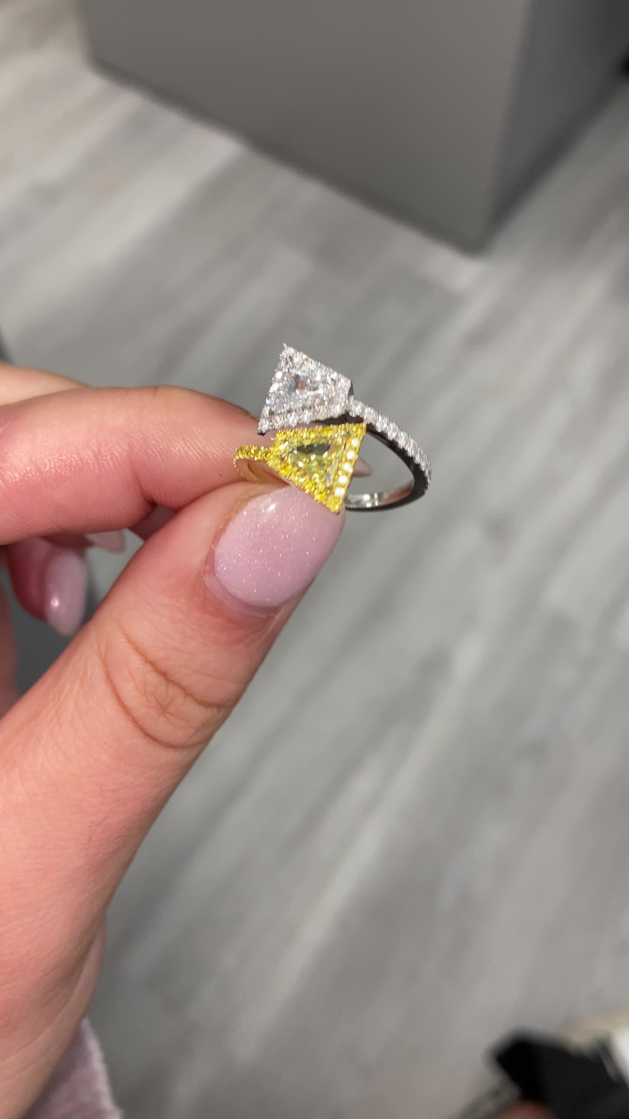 This contains: canary diamond two stone diamond statement ring