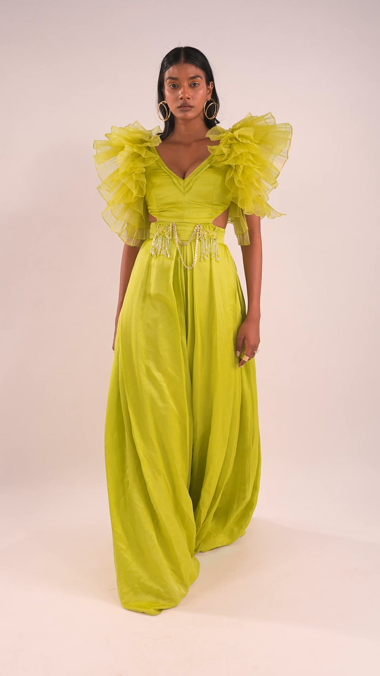 This contains an image of: Sheen Green Indo-Western Jumpsuit With Ruffle Sleeves In Viscos Linen And Satin