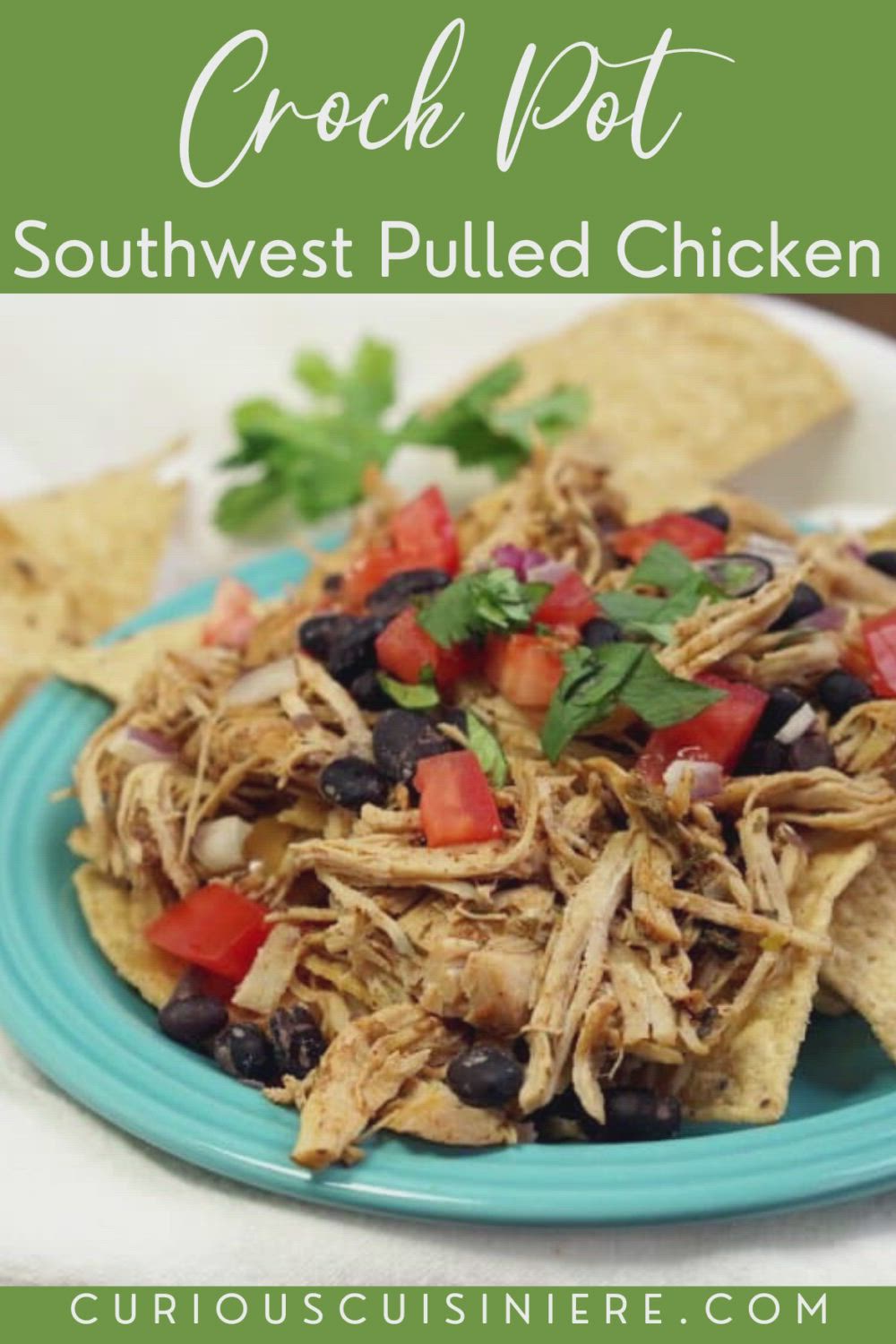 This may contain: crock pot southwest pulled chicken on a blue plate with tortilla chips