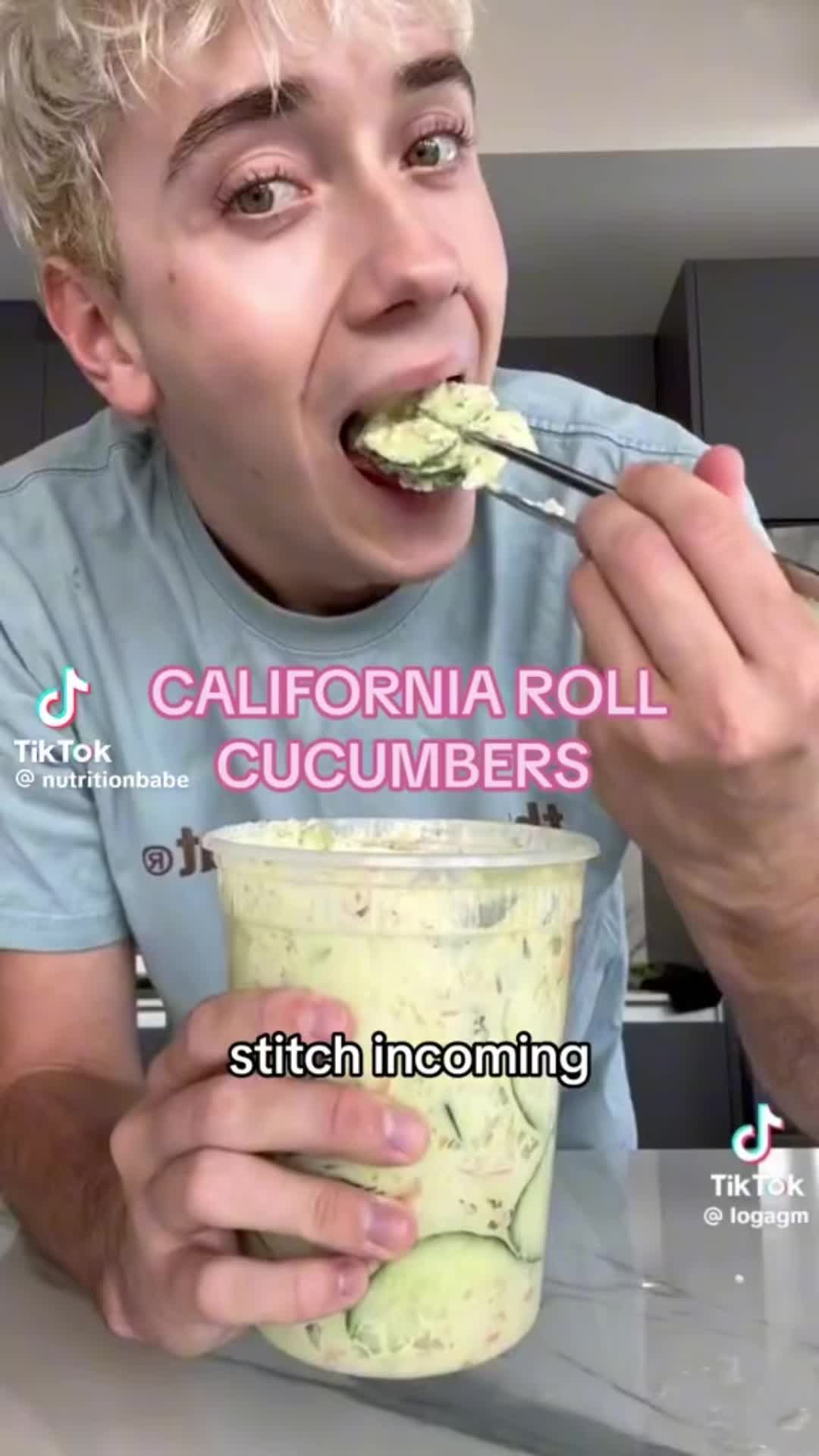 This may contain: a man eating food from a cup with the caption california roll cucumbers