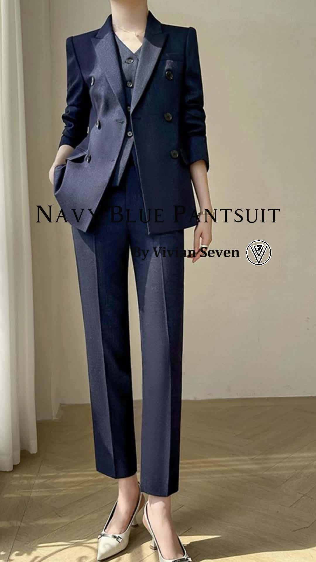 This contains: Navy Blue Double Breasted Blazer Vest Pants Suit Three-Piece Set