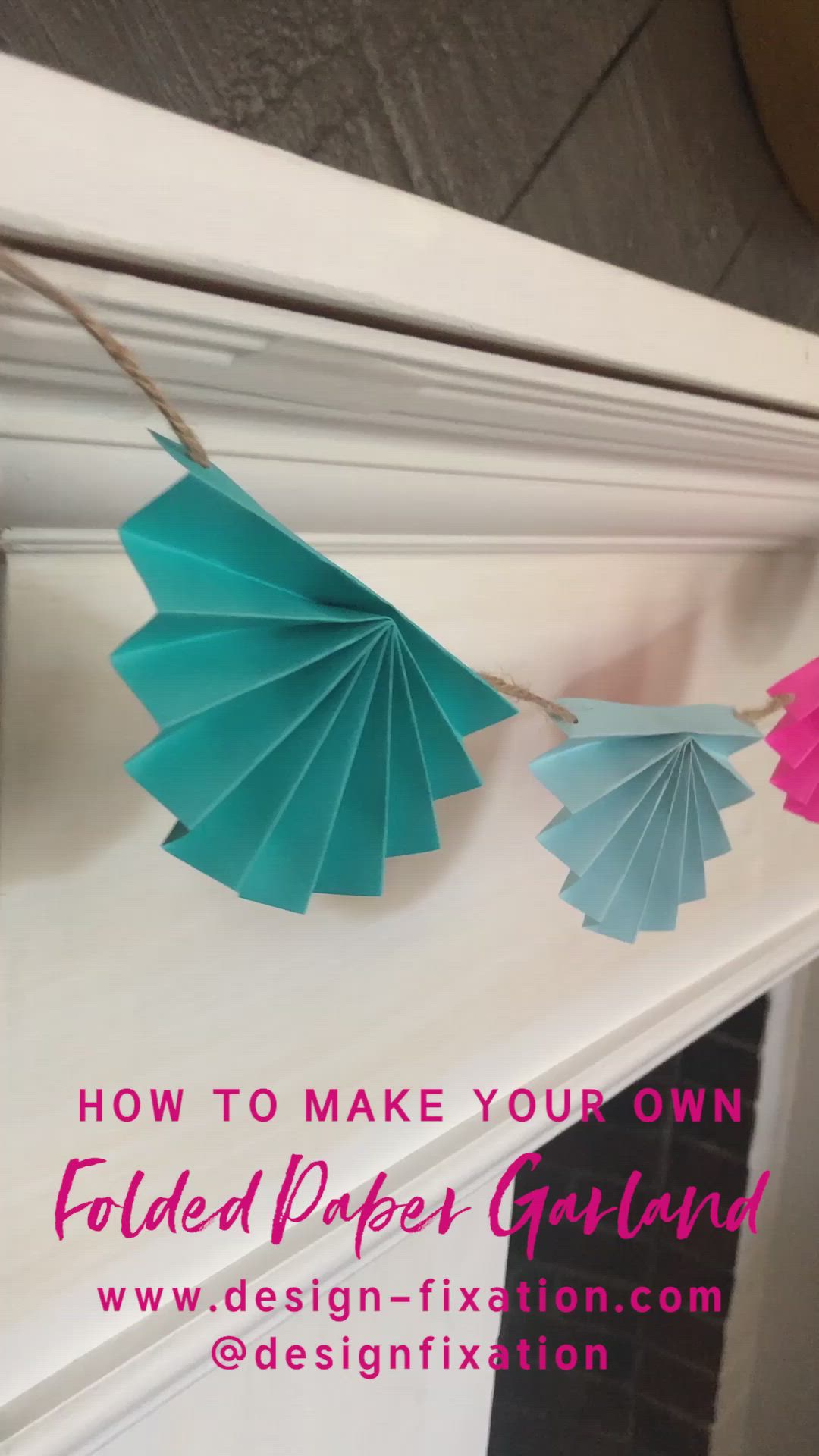 This may contain: some paper fans are hanging on the mantle in front of a fireplace with text overlay that reads how to make your own folded paper fan garland