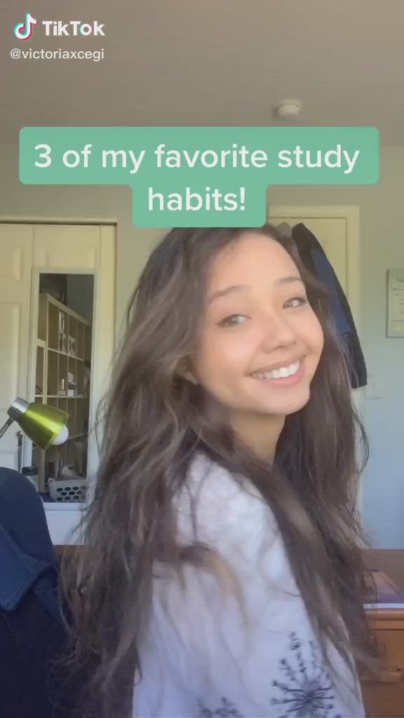 This may contain: a woman with long hair is smiling at the camera and has an ad above her head that says 3 of my favorite study habit