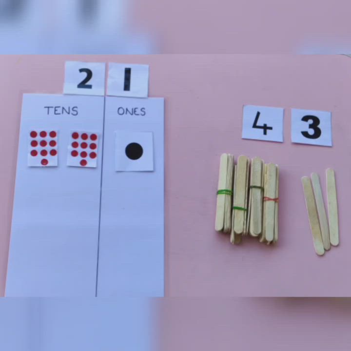 This may contain: some matches are placed next to each other on a pink surface with numbers cut out