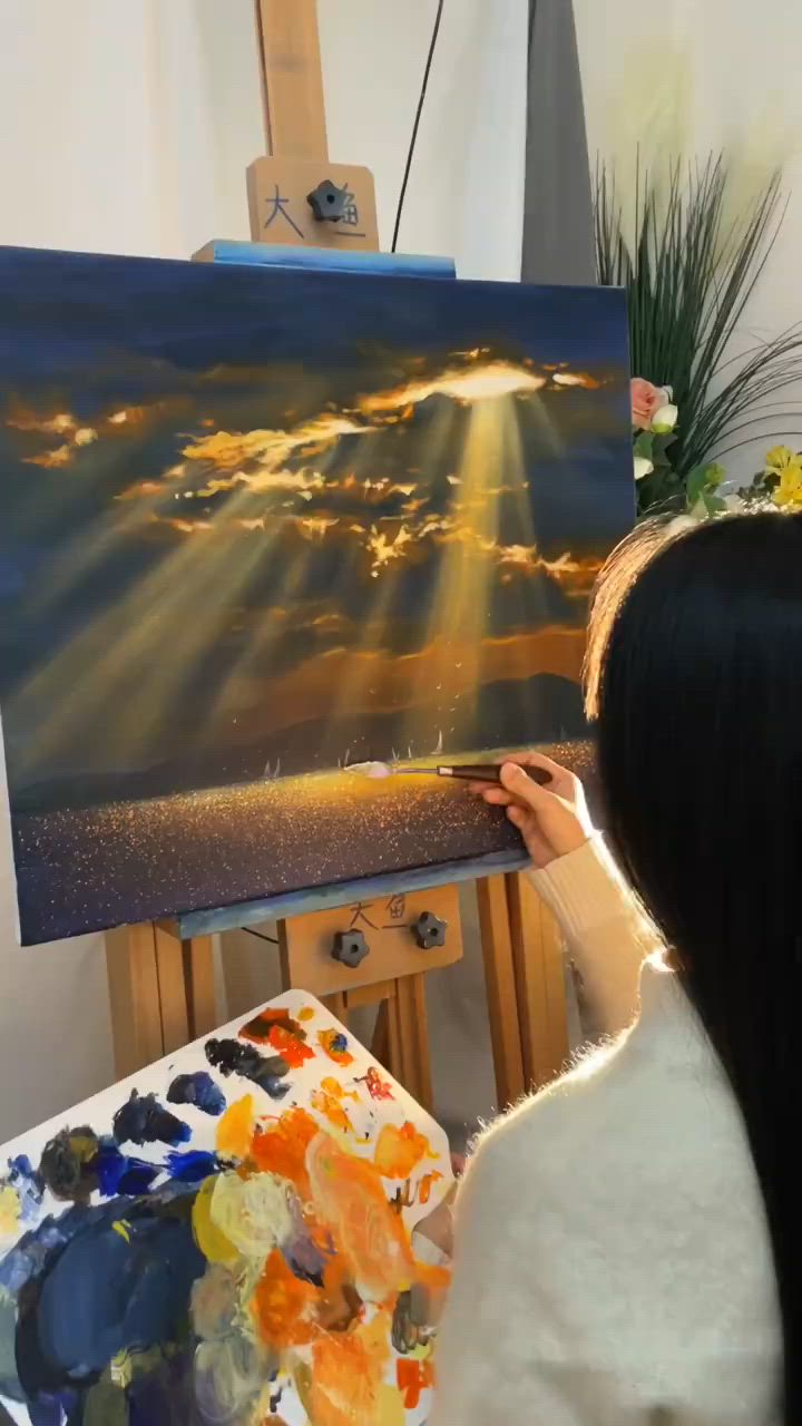 This may contain: a woman is painting on an easel in front of a window with the sun shining through