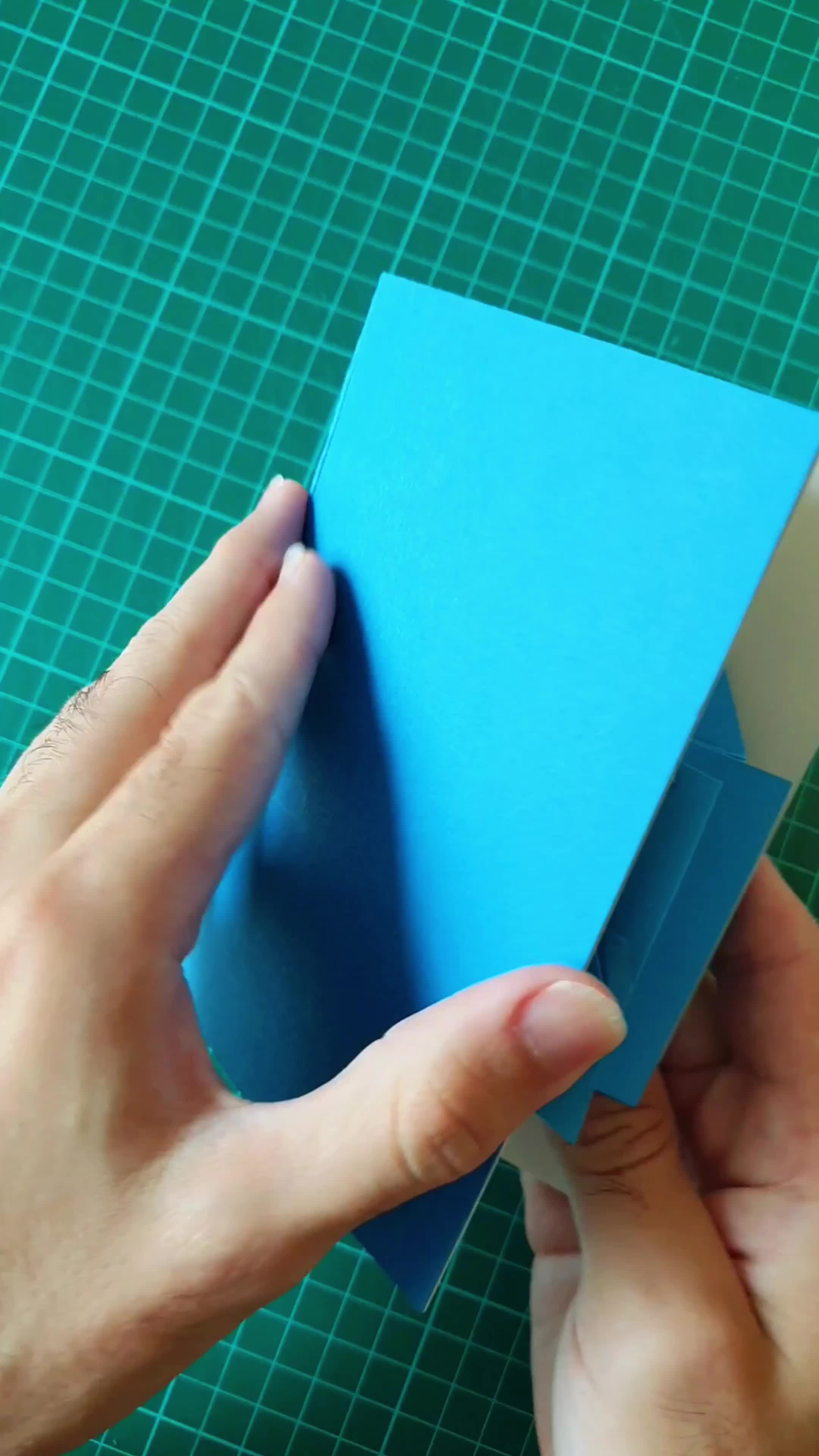 This may contain: top 10 pop - up mechanisms and shapes for origami, paper folding & more