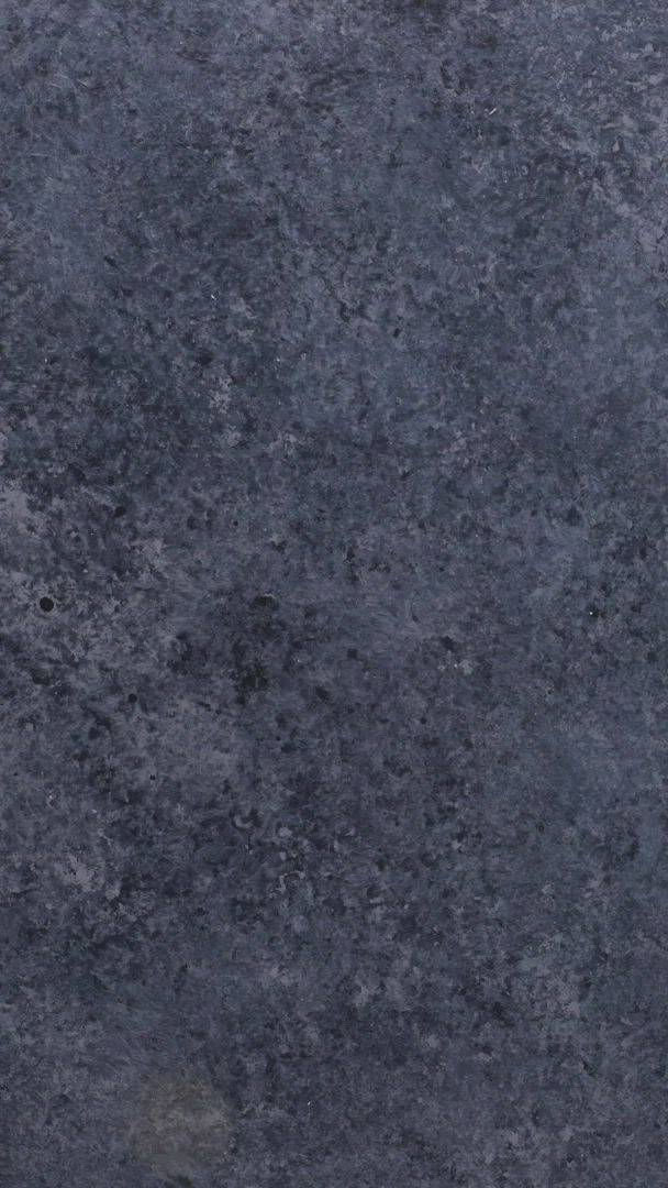 This may contain: an image of a black granite surface that looks like it could be used as a background