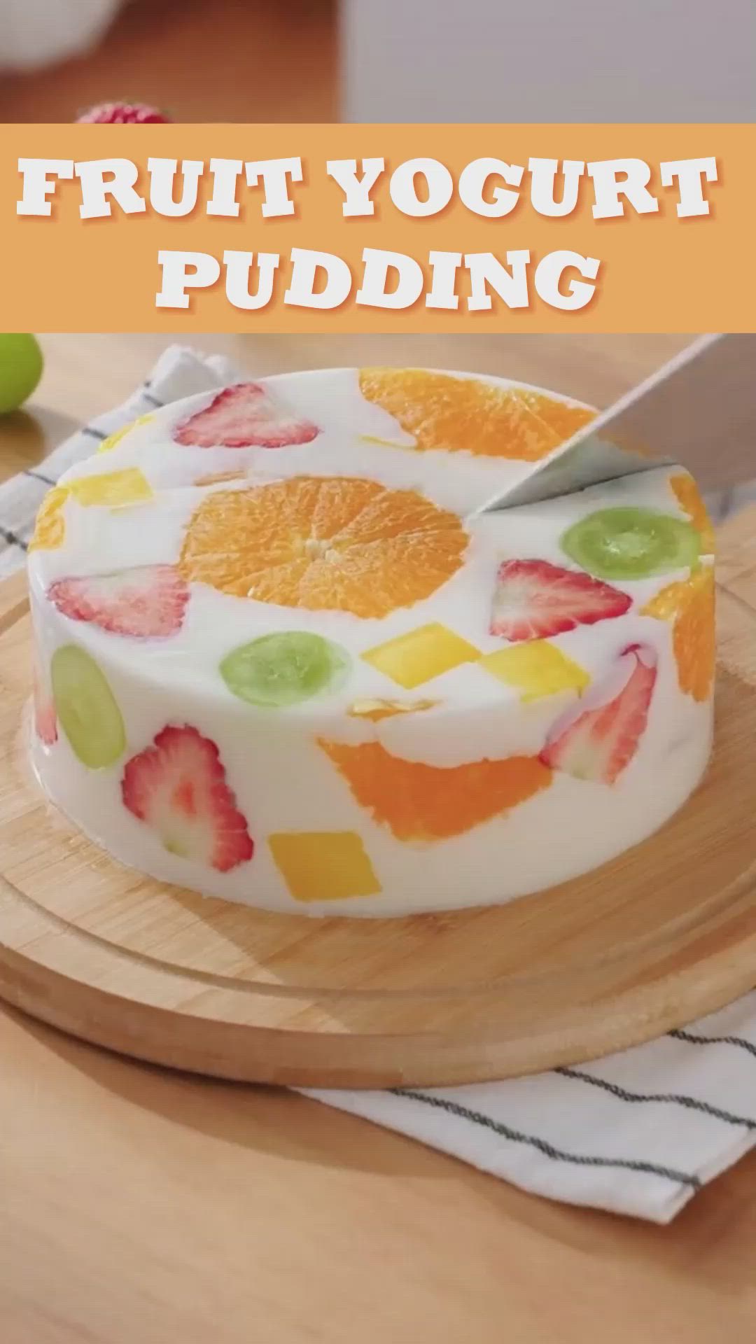 This may contain: a fruit yogurt pudding on a cutting board