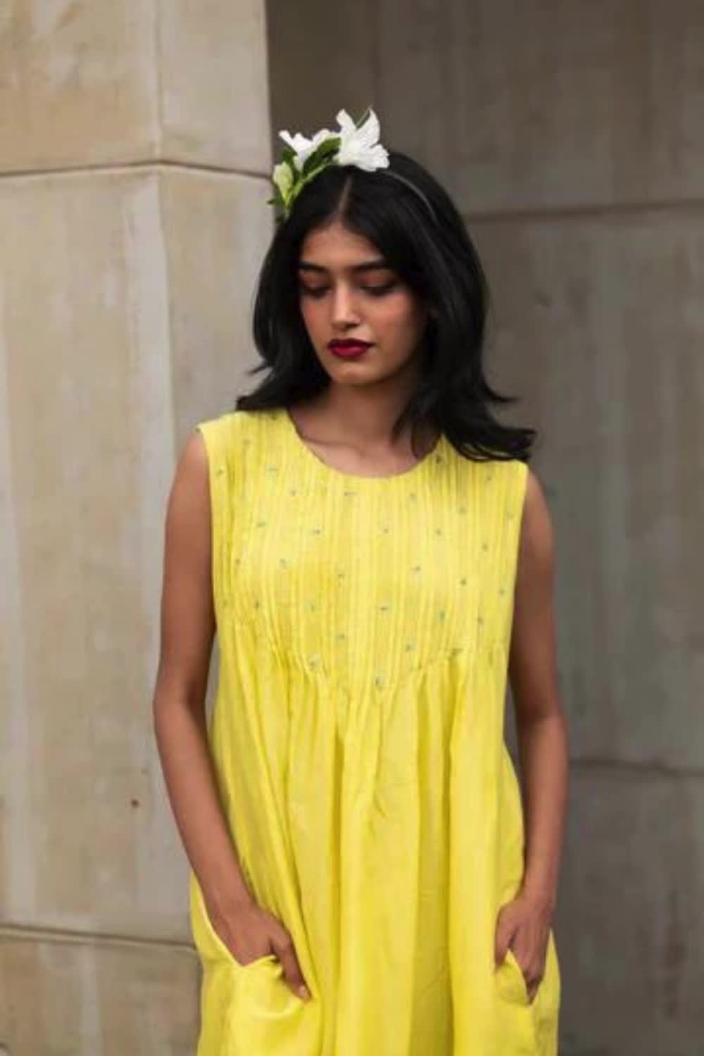 This contains: Yellow Sleeveless Cotton Silk Dress | Evening Wear | Solids