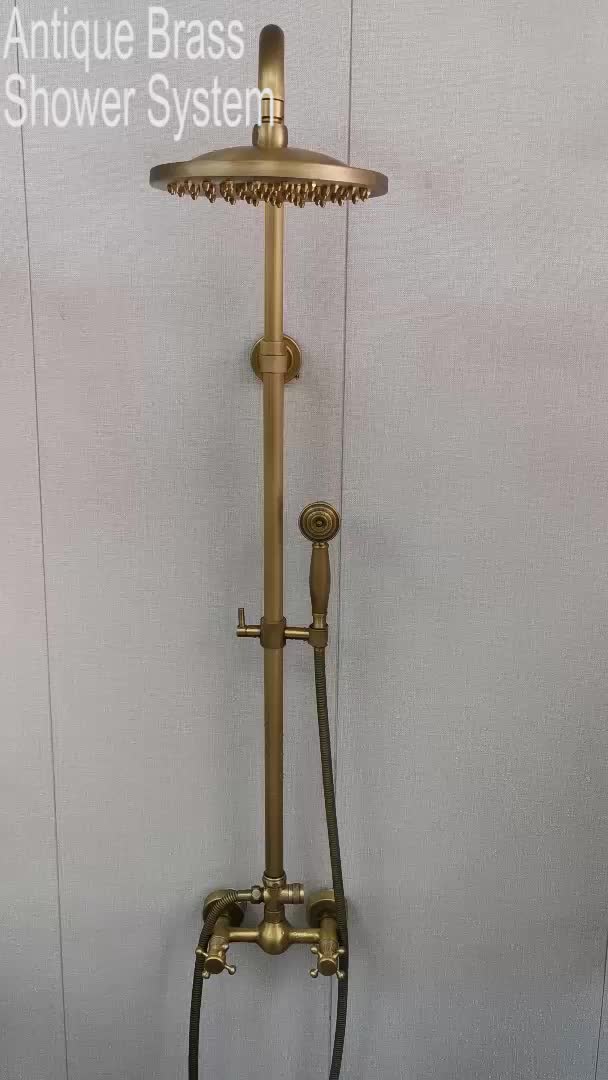 This may contain: an antique brass shower system in the bathroom