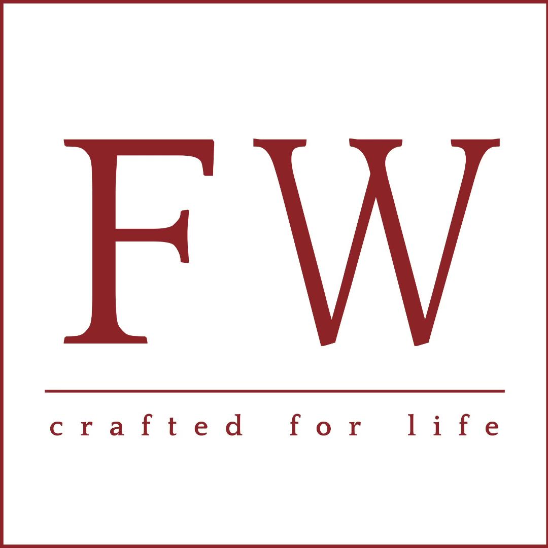 This may contain: the fw logo is shown in red and white