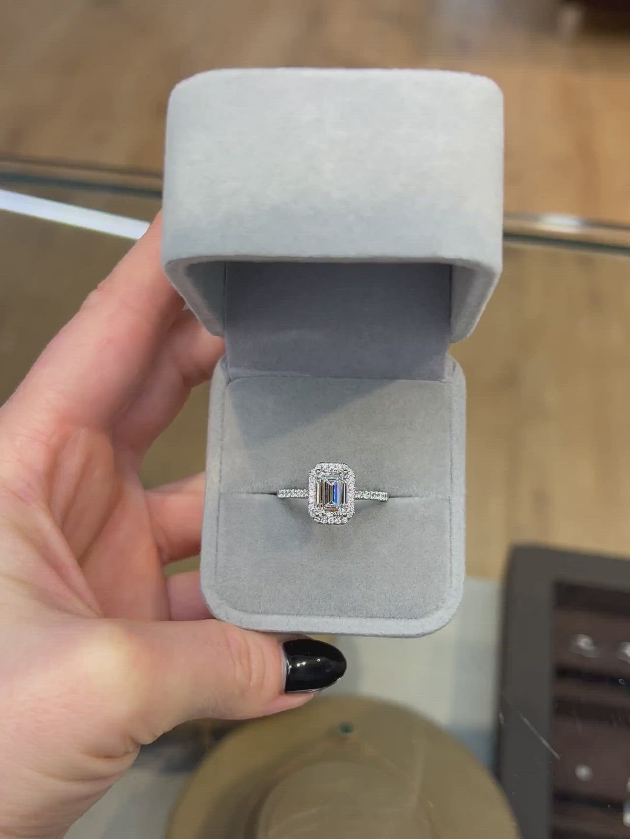 A beautiful 1.50 carat emerald cut lab grown diamond engagement ring in a halo setting of 0.40ct natural diamonds, for a 1.90 carat total. Designed with love and comfort for daily wear.