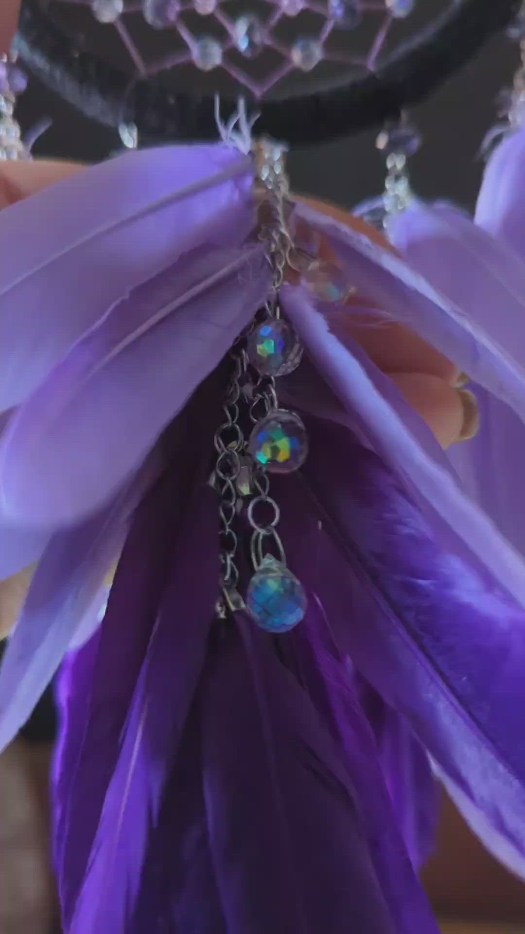 This contains: Purple dream catcher with teardrop crystal beads