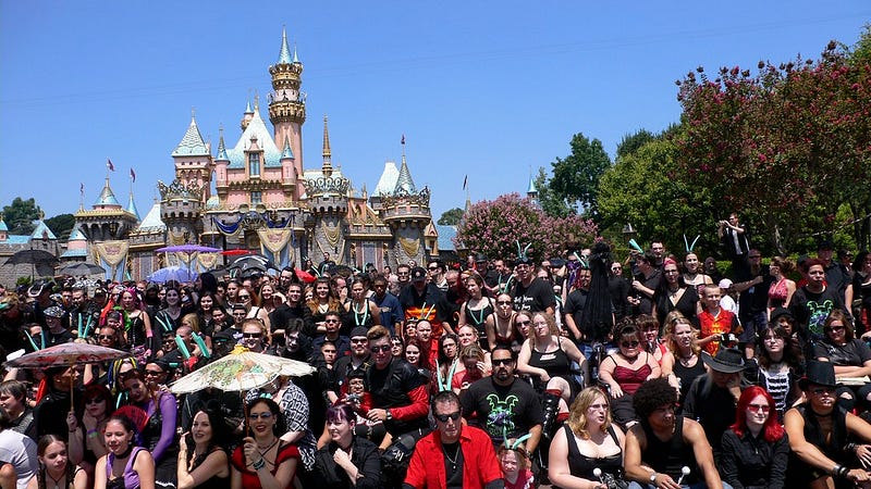 Group photo in front of the castle at Disneyland’s goth day, “Bat’s Day in the Fun Park,” August 2006.