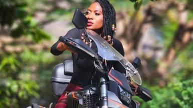 Udoh Ebaide Joy on her motorbike