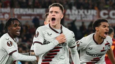 Florian Wirtz celebrates scoring the opener for Leverkusen