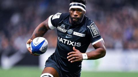 Siya Kolisi running with the ball