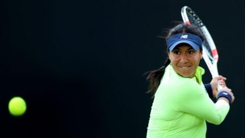 Heather Watson of Great Britain plays a backhand