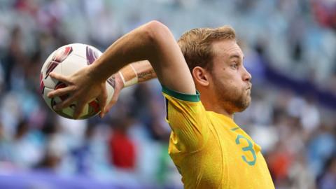 Nathaniel Atkinson playing for Australia