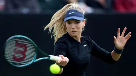 Katie Boulter of Great Britain plays a forehand