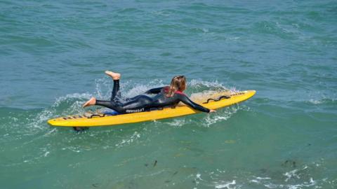 RNLI lifeguard Somer Juster-Horsfield in the water