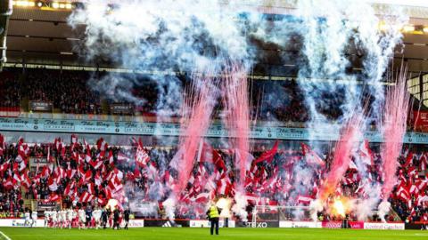 Aberdeen fans display during a William Hill Premiership match between Aberdeen and Motherwell at Pittodrie Stadium on September 14, 2024, in Aberdeen, Scotland.