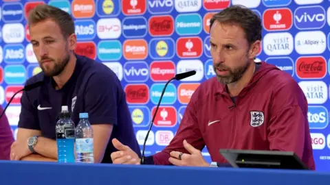 Harry Kane and Gareth Southgate speak before Euro 2024 match