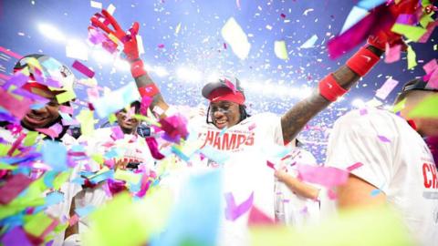 Jaylen McClain of the Ohio State Buckeyes celebrates after beating the Texas Longhorns 28-14 to win the Goodyear Cotton Bowl at AT&T Stadium in Arlington, Texas